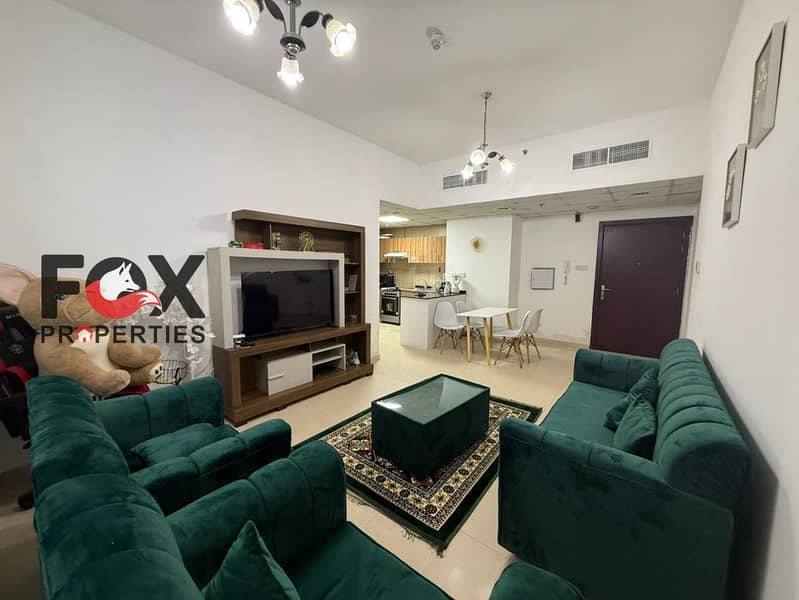 Furnished apartment for annual rent in City Tower, Al Nuaimiya 3. Free parking, balcony with view, premium finishing, prime location.