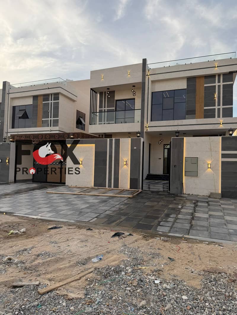 Luxury villa for sale in Al Rawda, Ajman. 5 BR, 5000 sq. ft. , majlis, 2 halls, maid room, outdoor kitchen, parking. AED 3.2M.