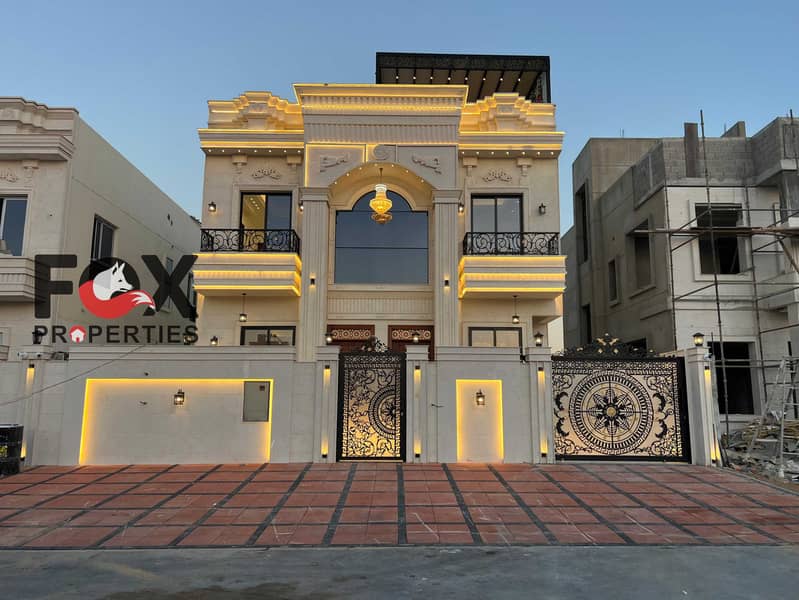 Luxury classic villa in Al Helio 2, Ajman | 5 master bedrooms, majlis, 2 living halls, rooftop, waterfall & deluxe finishes. Inclusive price.
